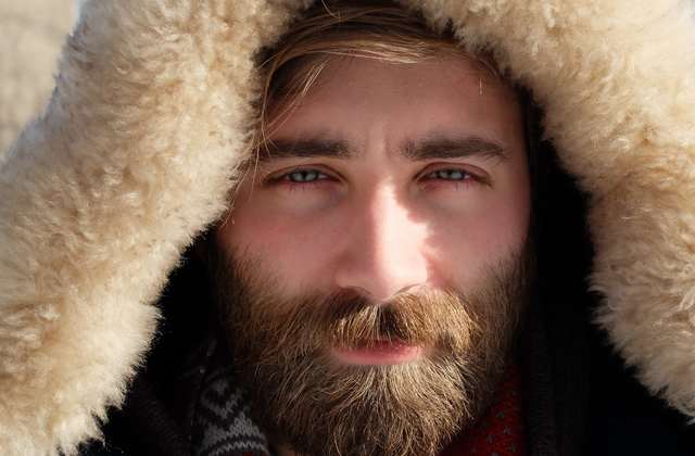 curly hair and beard look